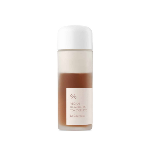 DR.CEURACLE Vegan Kombucha Tea Essence is a nutrient-rich, dual-phase essence that deeply hydrates and revitalizes the skin. Powered by Kombucha (Fermented Black Tea) and Green Tea Extract, it delivers a potent dose of antioxidants to help detoxify and strengthen the skin barrier. With added Ceramide NP, Centella Asiatica, and Sodium Hyaluronate, it soothes irritation, locks in moisture, and promotes a smooth, radiant complexion. Perfect for restoring balance and glow to dull, dehydrated, or stressed skin.