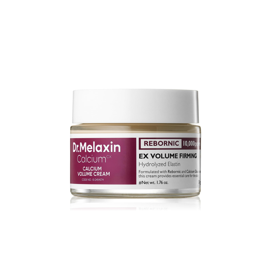 DR. MELAXIN Cemenrete Calcium Volume Cream is a nourishing facial cream made to hydrate, smooth, and improve the look of skin elasticity. Formulated with Calcium Gluconate, Magnesium Gluconate, Collagen Extract, Hydrolyzed Elastin, Niacinamide, Adenosine, Hydrolyzed Hyaluronic Acid, Hyaluronic Acid, Sodium Hyaluronate, Shea Butter, Macadamia Seed Oil, Olive Fruit Oil, Coconut Oil, and Tremella Mushroom Extract, it helps moisturize the skin while supporting a firmer, plumper-looking complexion. The rich form