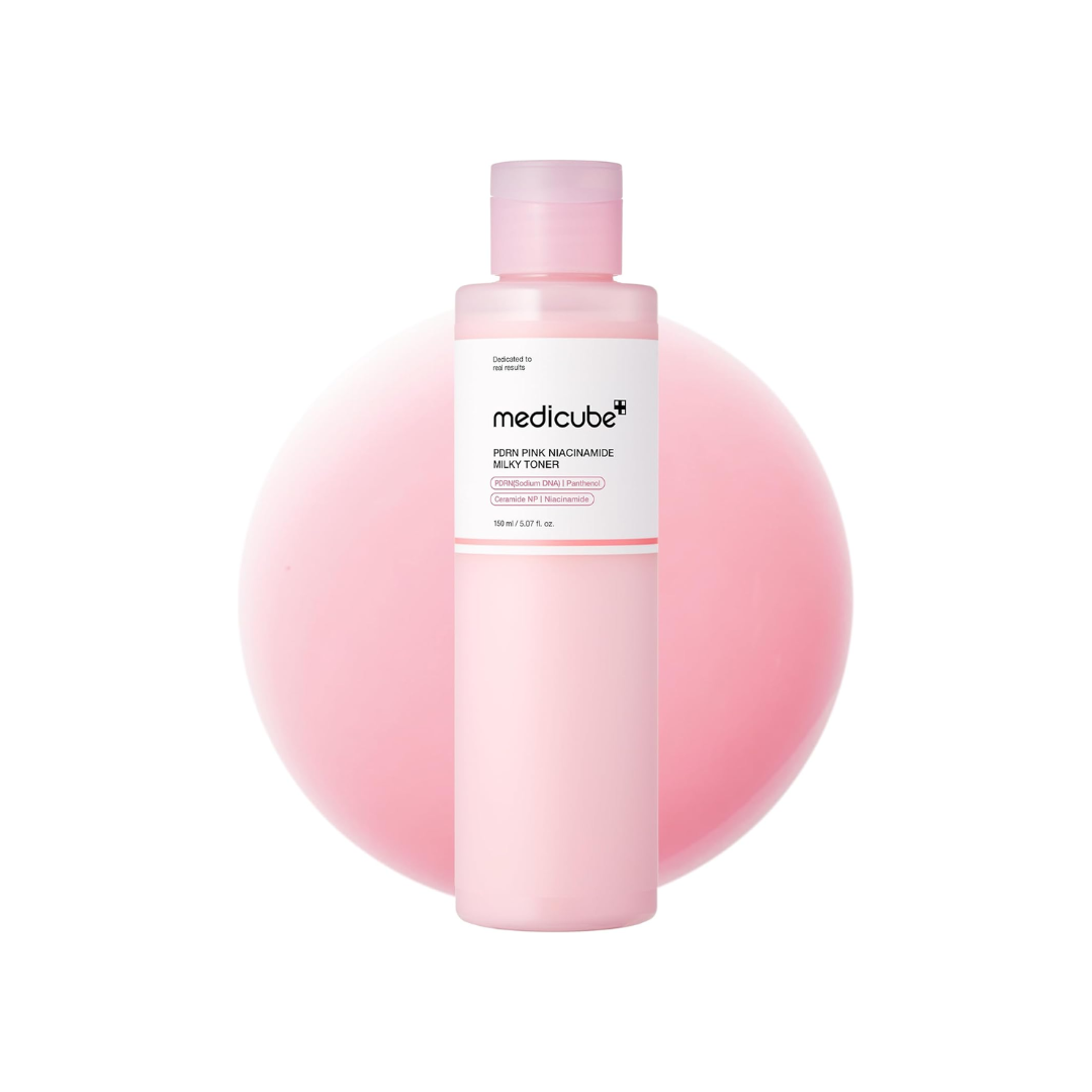 This milky glow toner, MEDICUBE PDRN Pink Niacinamide Milky Toner, is made to hydrate, soften, and give skin a dewy pink-glow finish. The lightweight milky texture absorbs quickly without stickiness, helping skin feel moisturized, smooth, and refreshed.

Formulated with Salmon DNA PDRN, Niacinamide, Ceramides, and Peptides, it helps support moisture, skin barrier care, radiance, elasticity, uneven tone, and smoother-looking texture. It is non-comedogenic tested and suitable for acne-prone, dry, normal, oily