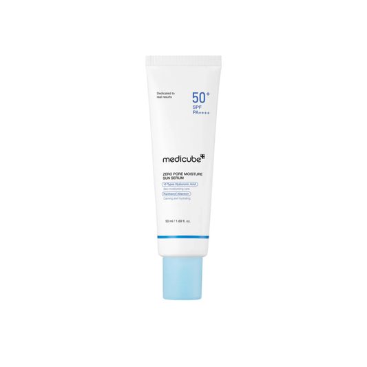 MEDICUBE Zero Pore Moisture Sun Serum is a lightweight, hydrating sunscreen that combines sun protection with pore care. Infused with Niacinamide and a complex of Hyaluronic Acids, it brightens and deeply moisturizes while keeping the skin smooth and balanced. Enriched with Turmeric, Centella, and Neem Extracts, it soothes irritation and helps refine pores for a clear, radiant complexion. This non-greasy, fast-absorbing formula is perfect for daily use, leaving your skin protected, fresh, and hydrated.