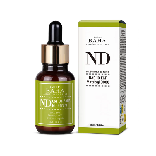 Cos De Baha ND Serum amber dropper bottle with green label next to its retail box, 30ml.