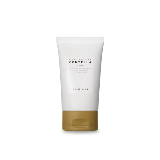 SKIN1004 Madagascar Centella Cream is a gentle, nourishing moisturizer that calms irritation, strengthens the skin barrier, and deeply hydrates. Formulated with Centella Asiatica Extract, Niacinamide, and soothing botanicals like Chamomile and Licorice Root, it helps reduce redness and support healthy skin. Rich in plant oils like Macadamia, Shea Butter, and Squalane, it provides long-lasting moisture without feeling heavy. This cream is ideal for sensitive, dry, or combination skin and works well for those