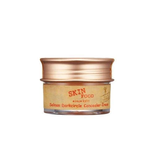 SKINFOOD Salmon Dark Circle Concealer Cream is a rich, creamy concealer specifically designed to target and brighten dark under-eye circles. Infused with Salmon Egg Extract, Vitamin E, and Ascorbyl Tetraisopalmitate, it nourishes and hydrates the delicate eye area while helping reduce puffiness and discoloration. The smooth texture blends seamlessly for natural coverage, leaving your under-eye area refreshed, radiant, and well-rested. Ideal for all skin types.